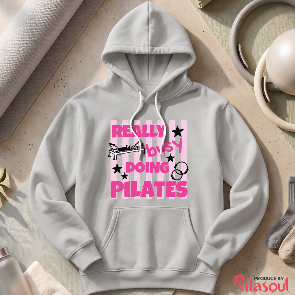 Really Busy Doing Pilates Hoodies
