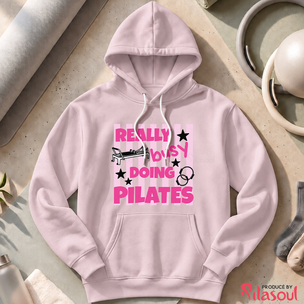Really Busy Doing Pilates Hoodies